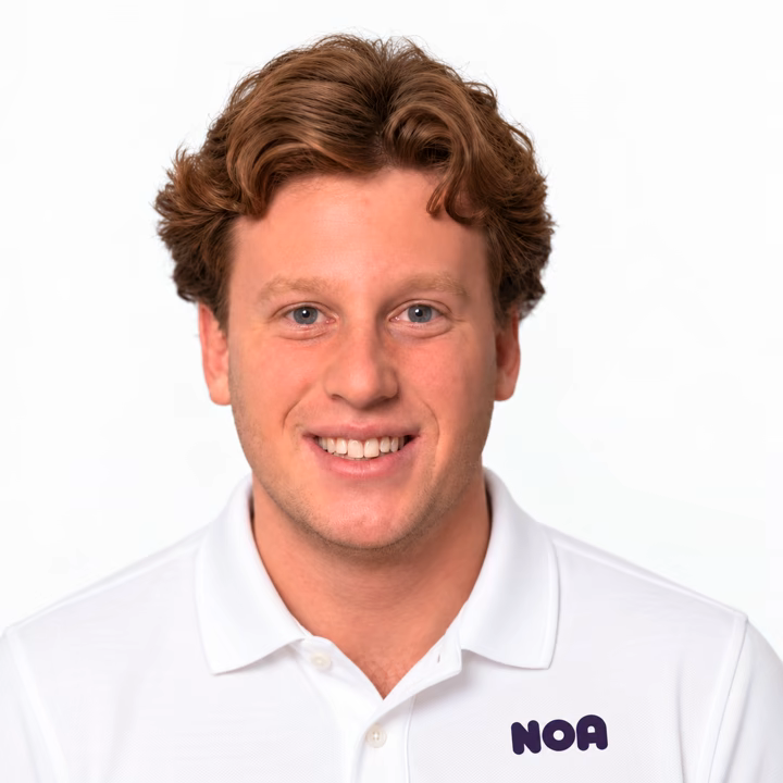 Founder of Noa Cleaning wearing a white Noa polo